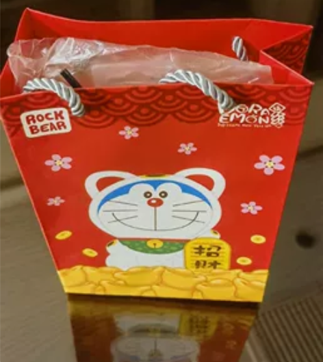 iPhone X 套装:哆啦A梦财来运转保...