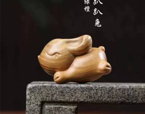 精品阿根廷绿檀木雕奔跑兔创意实木雕刻手把件...