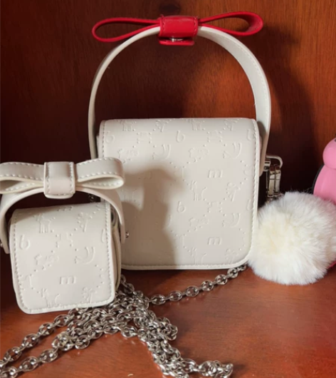 可小刀。全新不莱玫白色包包 送airpor...