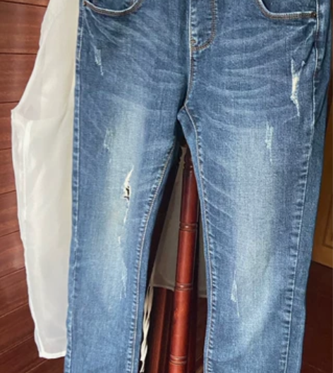 品牌破洞牛仔裤长裤 裤长100尺码写着28...