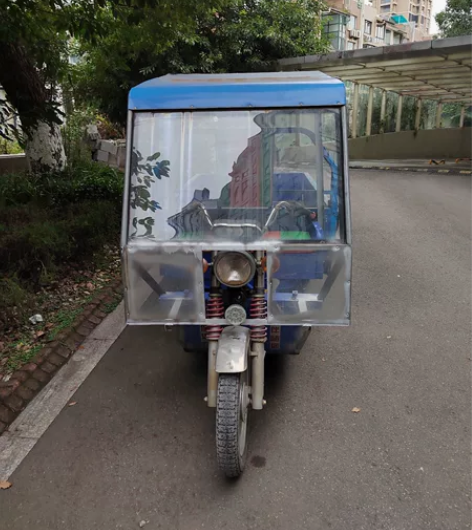 三鑫牌电动三轮车原价9300买的,车厢两米...