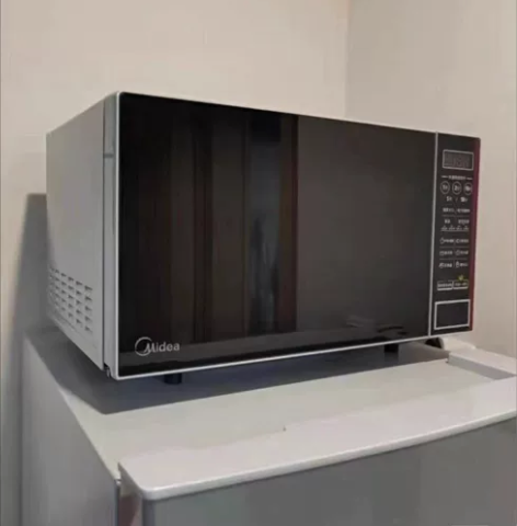 低价出售！8-9成新23L二手美的，格兰仕...