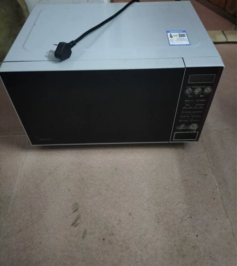 美的微波炉,美的牌子,加热只要1分钟。不包...