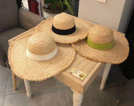 大檐毛边拉菲草编草帽女复古沙滩帽韩版百搭度...