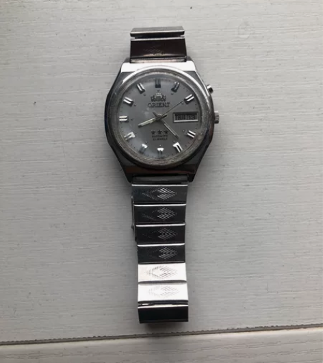 日本双狮全自动机械手表，动动能走字，不保准...