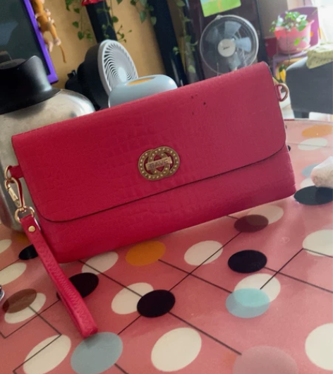 成都伊藤商场购入，真皮女士手拿信封包 也可...