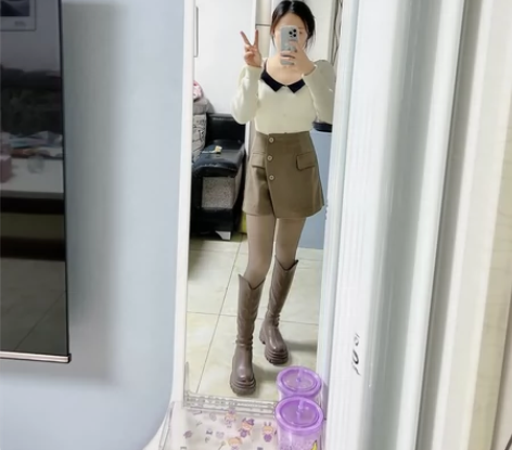 毛呢短裙女秋冬2022新款高腰不规则a字裙...