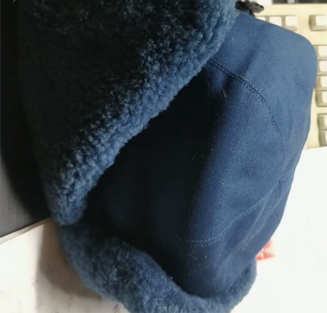 雷锋帽内置羊皮保真空皮帽剪标了号码56成色...