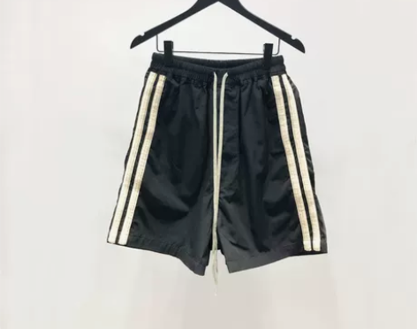 暗黑风格侧边白边织带拼接男士松紧带休闲裤低...