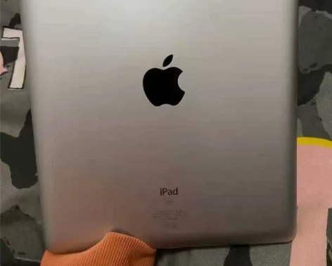 平板电脑带笔一起出iPad2平板电脑，图中...