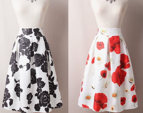 百褶高腰印花伞裙2021春季提花赫本风中长...