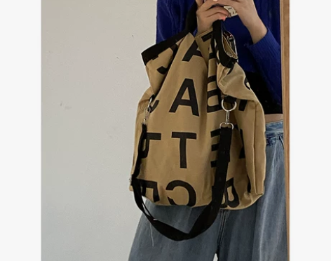 字母帆布包包女2021新款潮时尚韩国官网手...