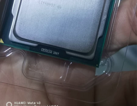 拆卖英特尔i7-2600K主机上 CPU主...