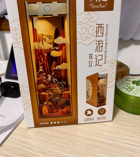 出一个西游记书立，仅保护膜撕了，110，有...