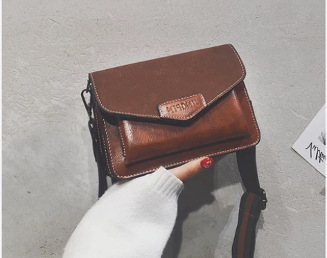 法国小众网红小黑包包女2019新款洋气质感...