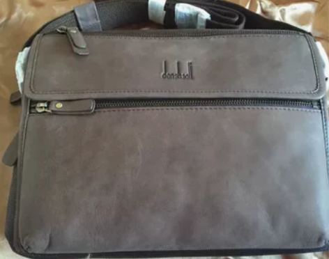 登喜世家男士单肩包 全新单肩包，前面部分磨...