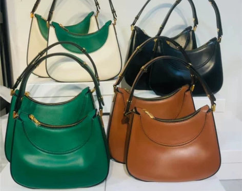 新款MiIano女款腋下包进口小牛皮半月形...