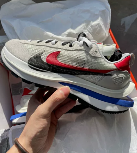 sacai x nike vaporwaf...