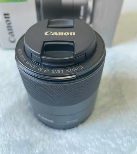 出一枚自用佳能EFM32mmF1.4STM...