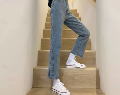 开叉高腰牛仔裤女修身chic港味显瘦早春新...
