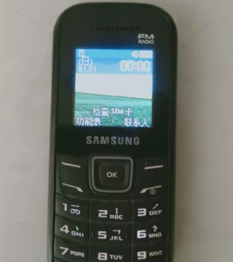 三星手机:E1205M，攻能正常，成色良好...