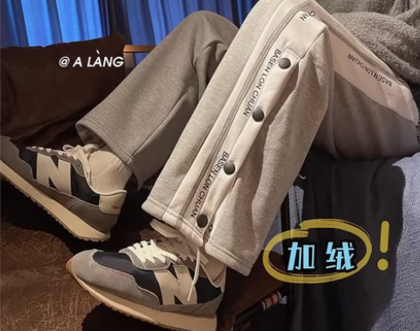 冬季新款加厚侧排扣直筒裤设计感小众休闲百搭...