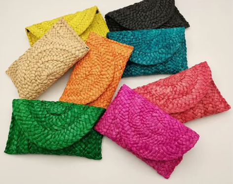 欧美风简约翻盖磁扣手拿包编织草编包 感兴趣...