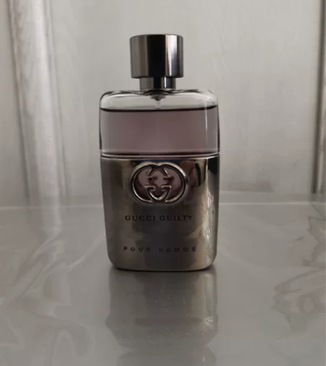 出一瓶50ml的Gucci男士香水 香味是...