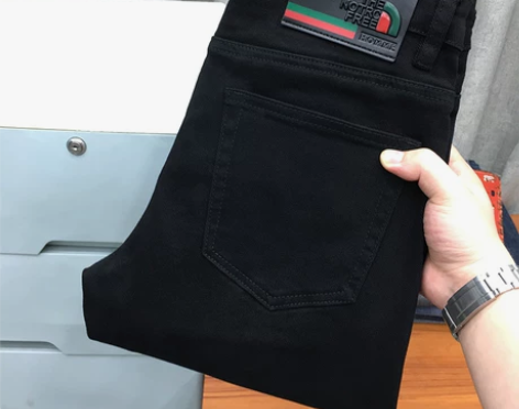 裤子男修身 裤子男裤秋冬季高端纯黑色牛仔裤...