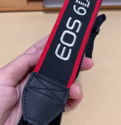 佳能 EOS 6D原装相机肩带 买来就没用...