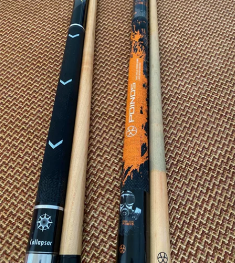 出售两根正版美式台球球竿，一根为黑洞R黑八...