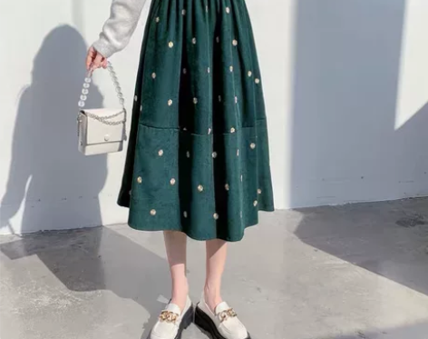 中长款碎花伞裙大摆裙2022新款秋冬高腰休...