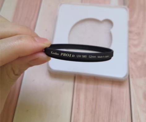 包邮肯高uv52mm滤镜 成色如图，镜片小...