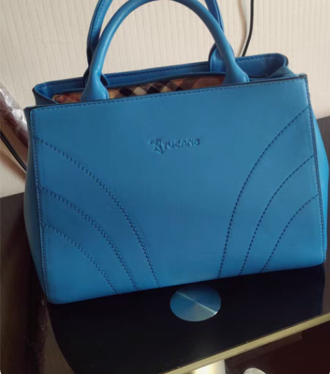 包邮啄木鸟女士手提包，质量相当好，用过一两...