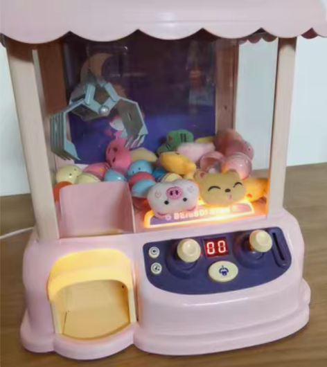 转卖网红儿童迷你抓娃娃机玩具小型夹公仔机投...