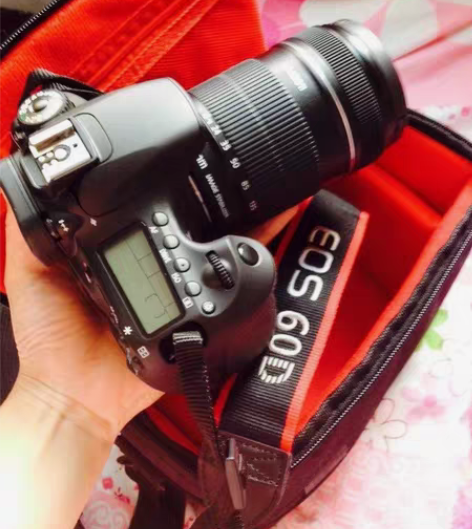 99新的佳能单反相机，原价6000多，现价...