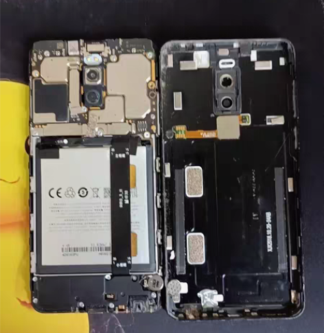 魅族V8，用着突然自动关机，维修店说手机主...