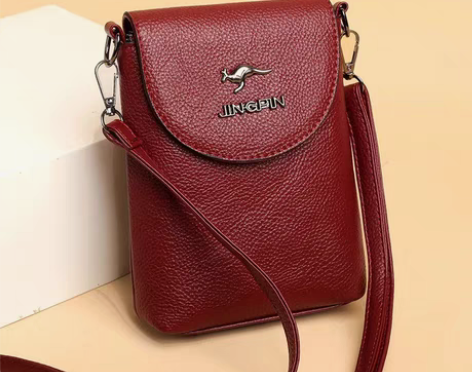 【亏本处理 ！】袋鼠真皮质感迷你斜挎手机包...