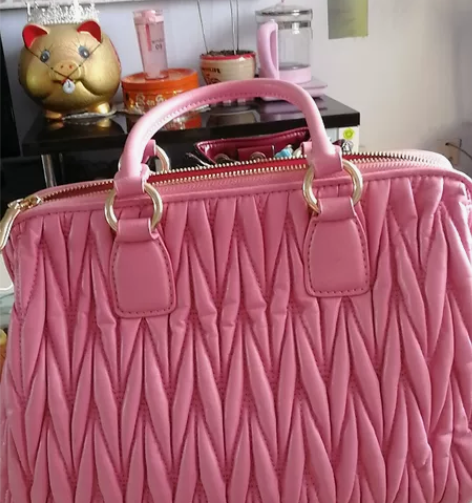 玫红色包包，长35CM，高24CM，宽18...