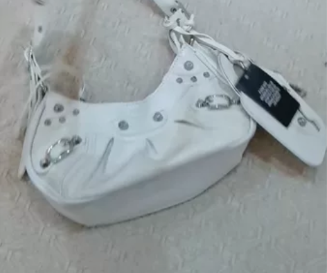 莫名爱买包，一时冲动在代购那儿买的机车包 ...