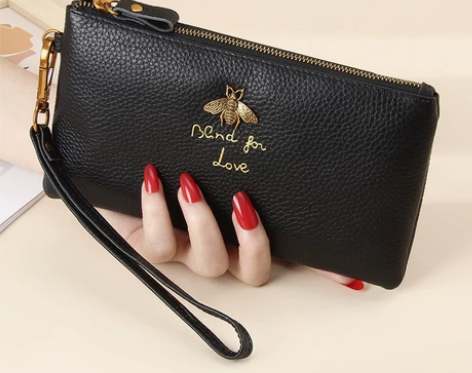 全新头层牛皮女士手拿包，真皮拉链长款钱包放...