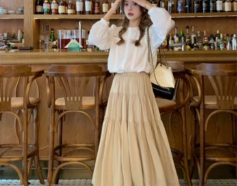 迟伞伞 木兰沁秋 垂坠感蛋糕卡其色半身长裙...