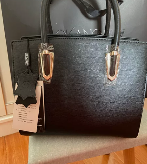 奥康手提包,全新,包装袋子都在,老公600...