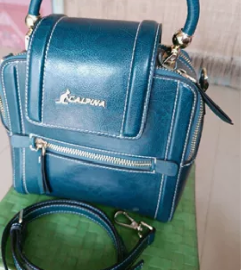 真皮正品袋鼠单肩斜挎手提包包，喜欢的小姐妹...